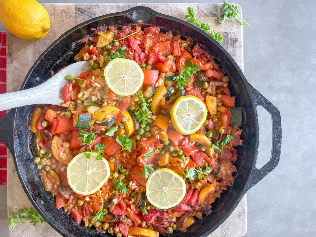 Vegetarian Paella Recipe, large shallow pan full of paella ready to eat