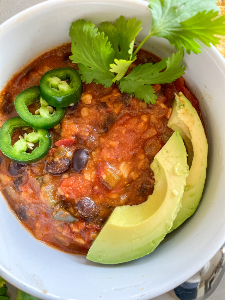 Qdoba Tortilla Soup Recipe with avocado and jalapeno peppers, cilantro