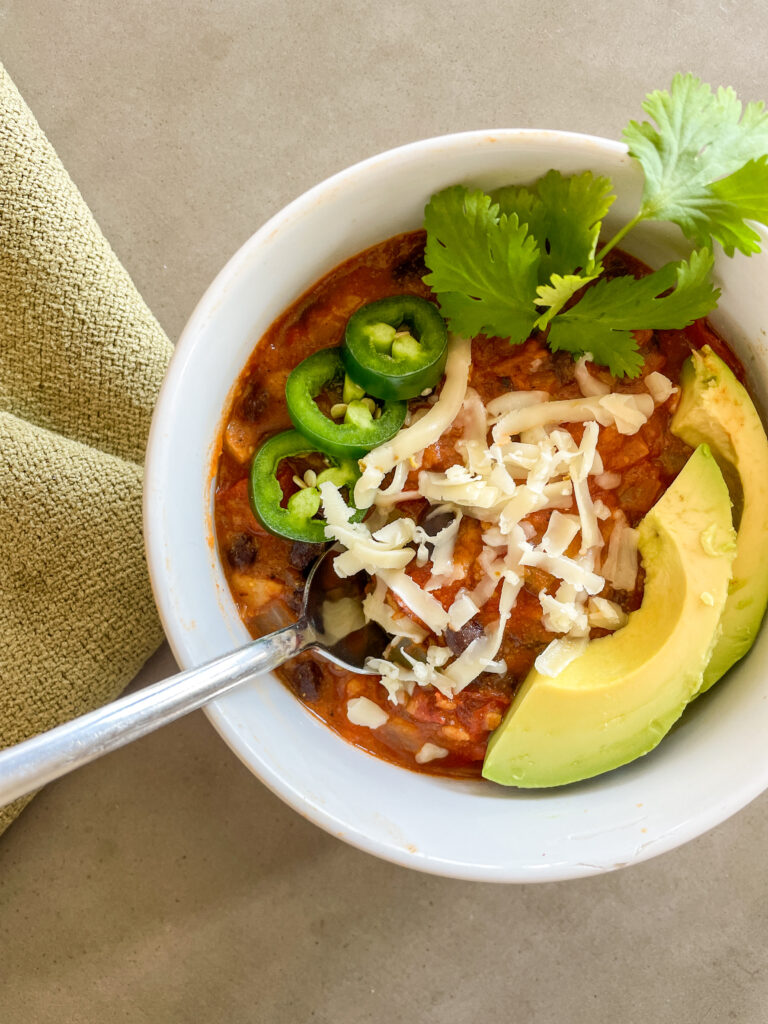 Qdoba Tortilla Soup Recipe with avocado and jalapeno peppers, cilantro