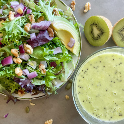 spring mix salad with walnuts and pepitas, kiwi vinaigrette salad dressing