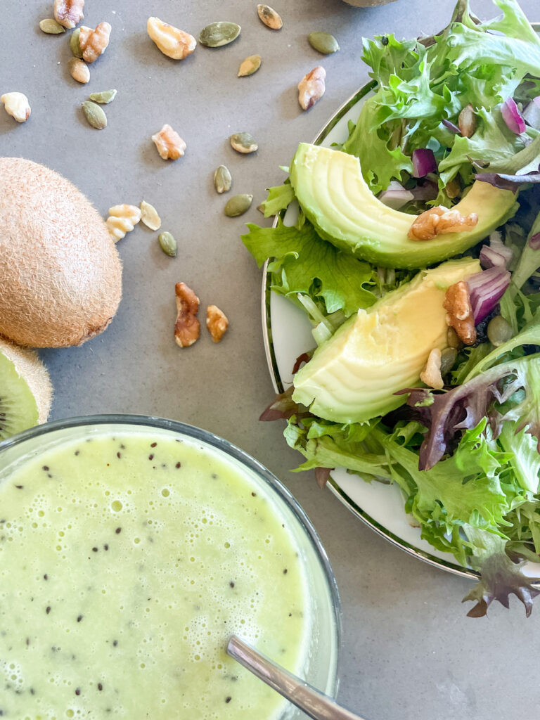 spring mix salad with walnuts and pepitas, kiwi vinaigrette salad dressing