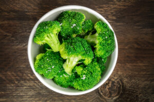 Cooked broccoli florets, A bowl of cooked green broccoli