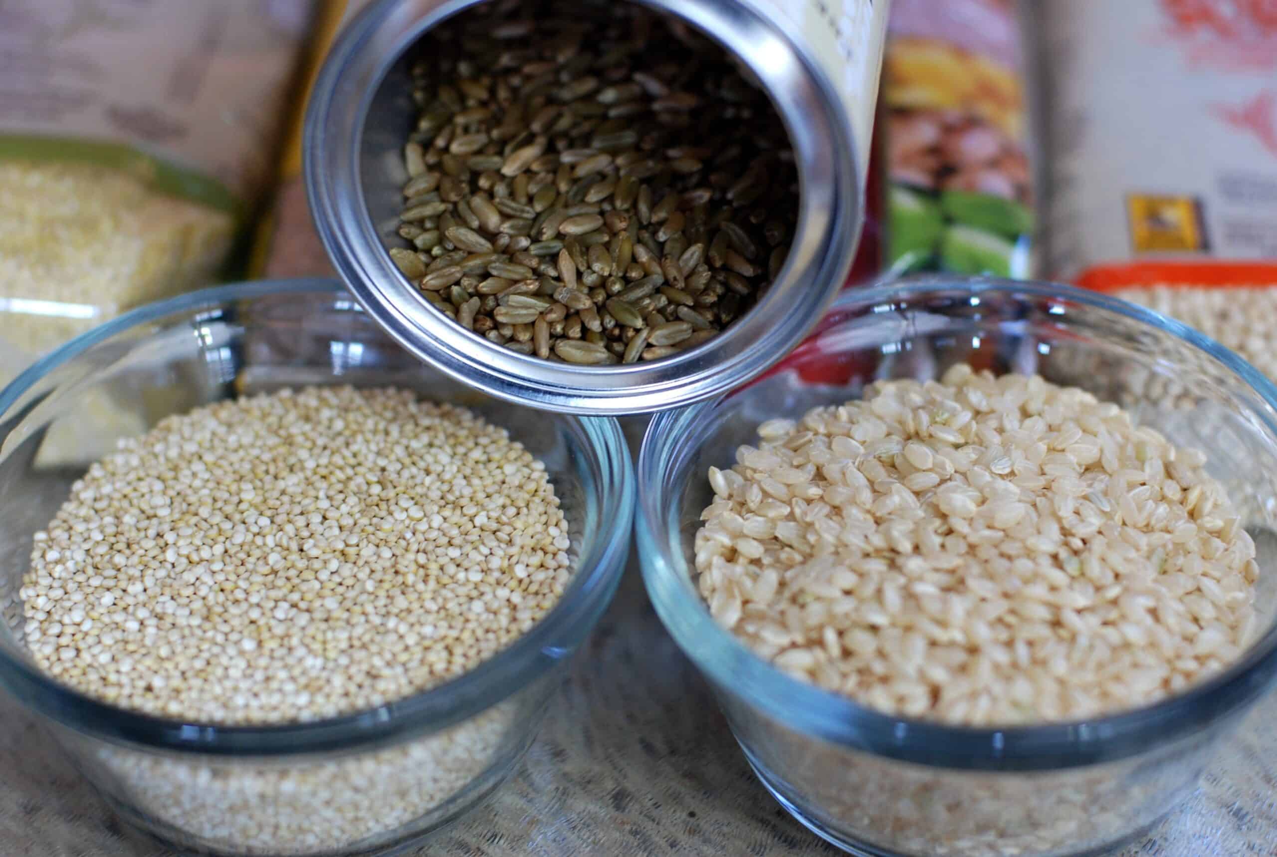 Quinoa and various rice in a glass bowls